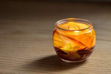 Aromatic candle in a glass jar