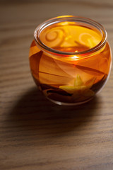 Aromatic candle in a glass jar