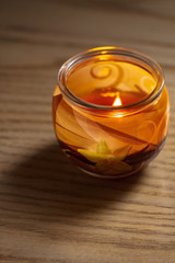 Aromatic candle in a glass jar