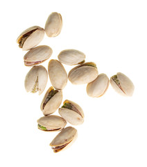 Ripe pistachios nuts isolated on a white background