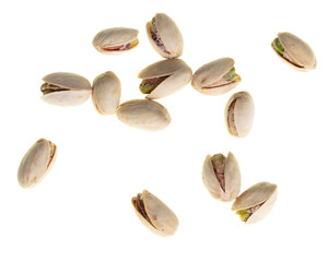 Ripe pistachios nuts isolated on a white background
