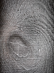 Hoarfrost on a wooden board as a background