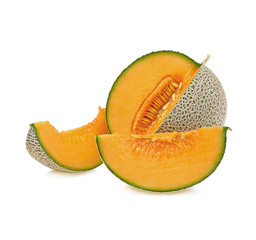 whole and slice of japanese melons, orange melon or cantaloupe melon with seeds isolated on white background