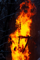 Flame of fire from a burning house as an abstract background