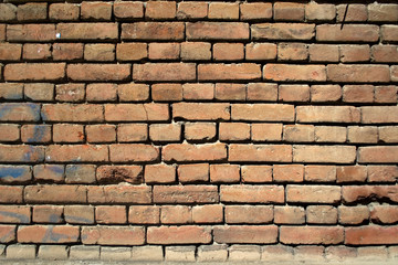 Fototapeta premium Part of the brick wall in the old town. Different bricks, whole and slightly broken. Part 2
