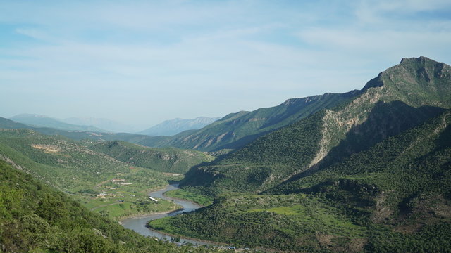 A scenery of The northern Iraq ( Iraqi Kurdistan region)'s nature valley river and mountains in spring time