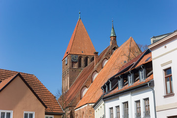 Fototapeta na wymiar Rooftops and church tower in old town Grimmen, Germany