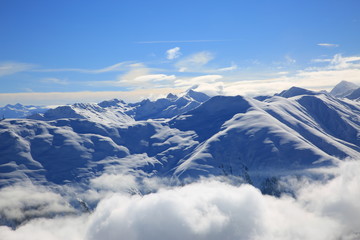 Fototapeta na wymiar Mountains in the cloud