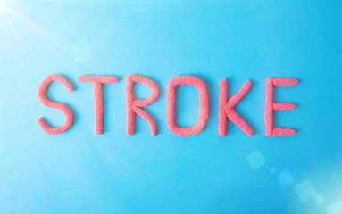 Fototapeta premium Stroke word in red letters on a blue background. Brain Vascular Stroke Disease Concept, haemorrhage