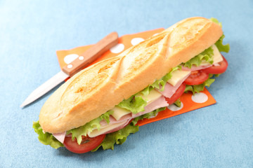 sandwich- bread with ham, cheese and tomato