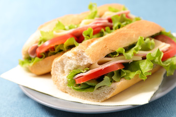 sandwich- bread with ham, cheese and tomato