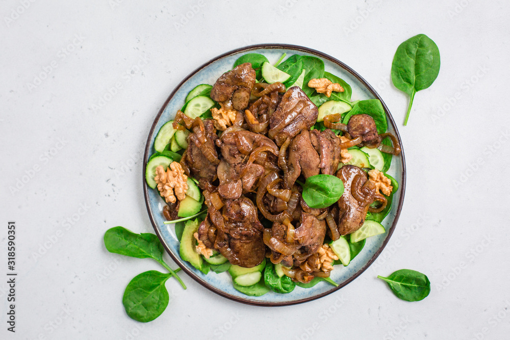 Canvas Prints Salad with chicken liver, spinach, cucumbers, avocado and walnuts.