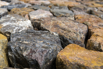 Close up of rough cut stone wall, Background.