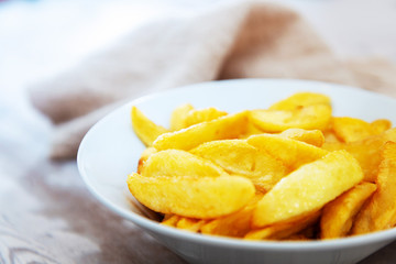 Golden French fries potatoes ready to be eaten