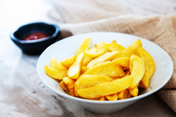Golden French fries potatoes ready to be eaten