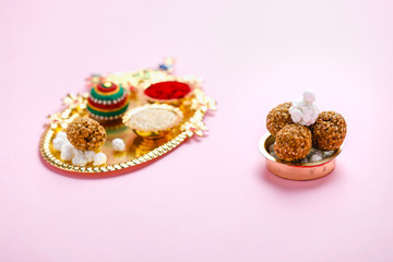 Indian festival makar sankranti concept, Sesame seed ball or til ke laddo, tilgul and Kite String 
