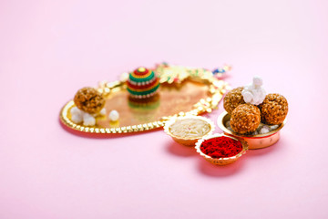 Indian festival makar sankranti concept, Sesame seed ball or til ke laddo, tilgul and Kite String 