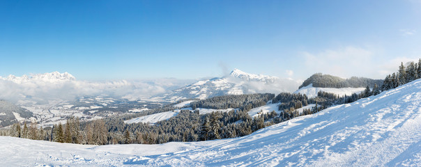 Panoramic winter view of the Kitzbuhel Alps in Austria including the Kitzbuheler Horn and Kaisergebirge Massif