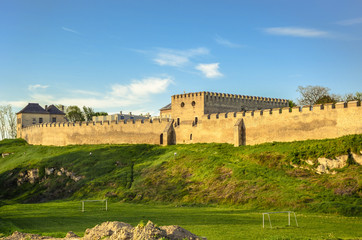 Fototapeta na wymiar The city walls and The Royal Castle, Szydlow, Swietokrzyskie Voivodeship, Poland.