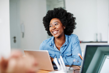 portrait young african american girl woman smiling office classroom - Powered by Adobe