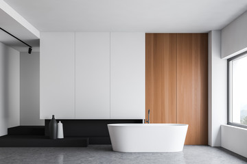 Fototapeta na wymiar White and wooden bathroom with tub and vase