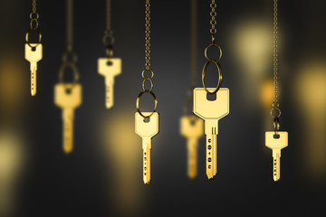 Gold keys on chains, real estate concept