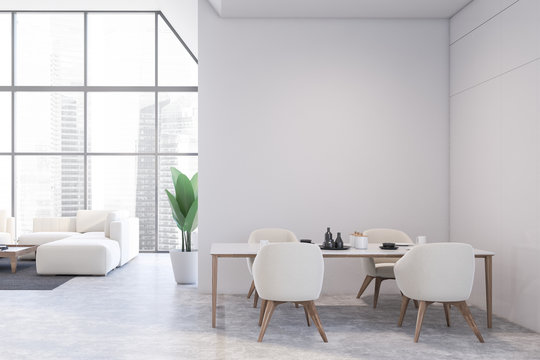 White dining room and living room interior