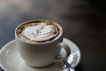 Latte coffee cup at coffee shop.