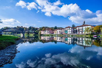 Brivio landscape reflected on the Adda river with the bridge
