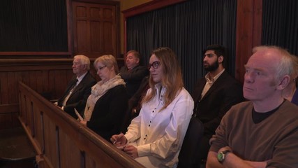 Jury sat in Courtroom during court case. They are listening to the facts from the legal proceedings.