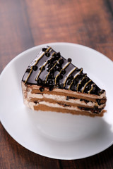Chocolate Cream / Pastry with Choco Chips on Wooden Table