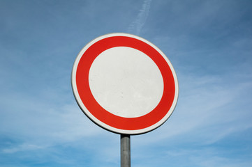 No entry - prohibitiory trafic sign is prohibiting and forbidding to enter and trespass. Blue sky...