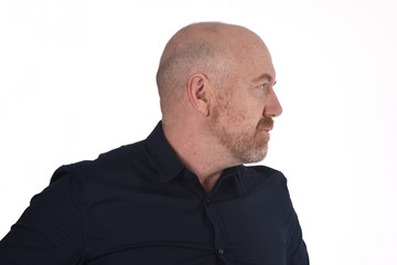 portrait of profile of  a bald man on white