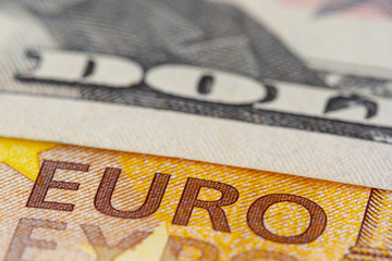 Euro banknotes and dollars