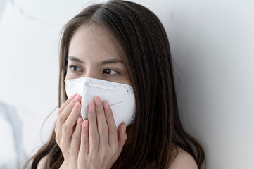 Woman wearing face mask  for Prevent  PM2.5  pollution
