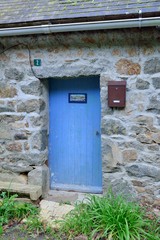 Naklejka premium Old wall in granite stones in Brittany. France