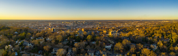 Aerial photo Redmont Park Birmingham Alabama with view of Downtown at sunset - obrazy, fototapety, plakaty