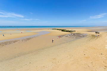 Remains of the temporary harbor used during the second world war, Arromanches, France