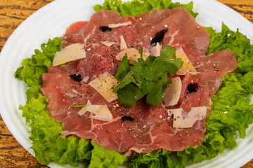 Beef carpaccio with parmesan cheese