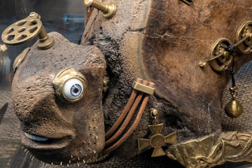 Surgut, Russia, January 12, 2020: a mammoth bone Product in the form of a fabulous sea monster. Selective focus.
