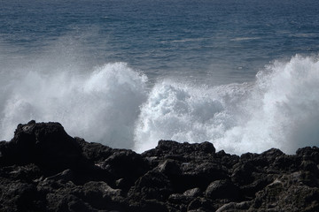 Fototapeta na wymiar Lanzarote. High waves splashing the coast