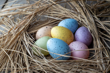 Naklejka na ściany i meble Easter eggs on wooden background
