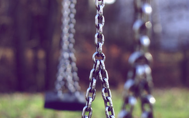 Swing chain on a playground shows cohesion and team spirit