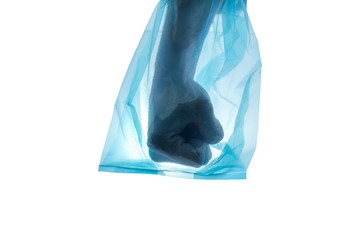 Silhouette of hand try to punch through blue plastic bag isolated on white background, plastic pollution and environmental problem, global warming and zero waste concept.