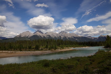 Naklejka premium Lake, Mountain lake, alpine meadows and rocky summits in the Rocky Mountains in Canada, British Columbia, West coast
