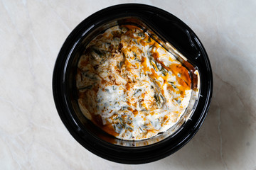 Take Away Healthy Turkish Food Chard with Yogurt, Walnut and Red Oil Sauce.