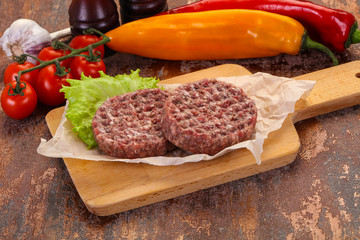 Raw burger cutlet