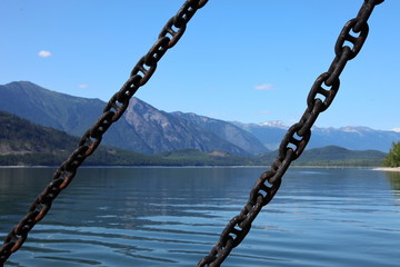 Lake, Mountain lake, alpine meadows and rocky summits in the Rocky Mountains in Canada, British Columbia, West coast