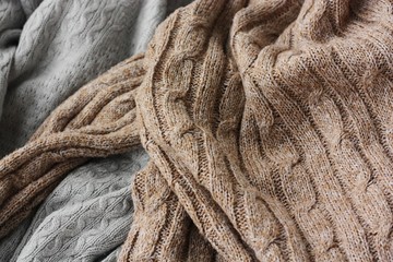 Beautiful knitted grey and brown sweaters macro