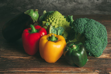 Vegetables from organic farming on a wooden background. Healthy food concept.Copy space